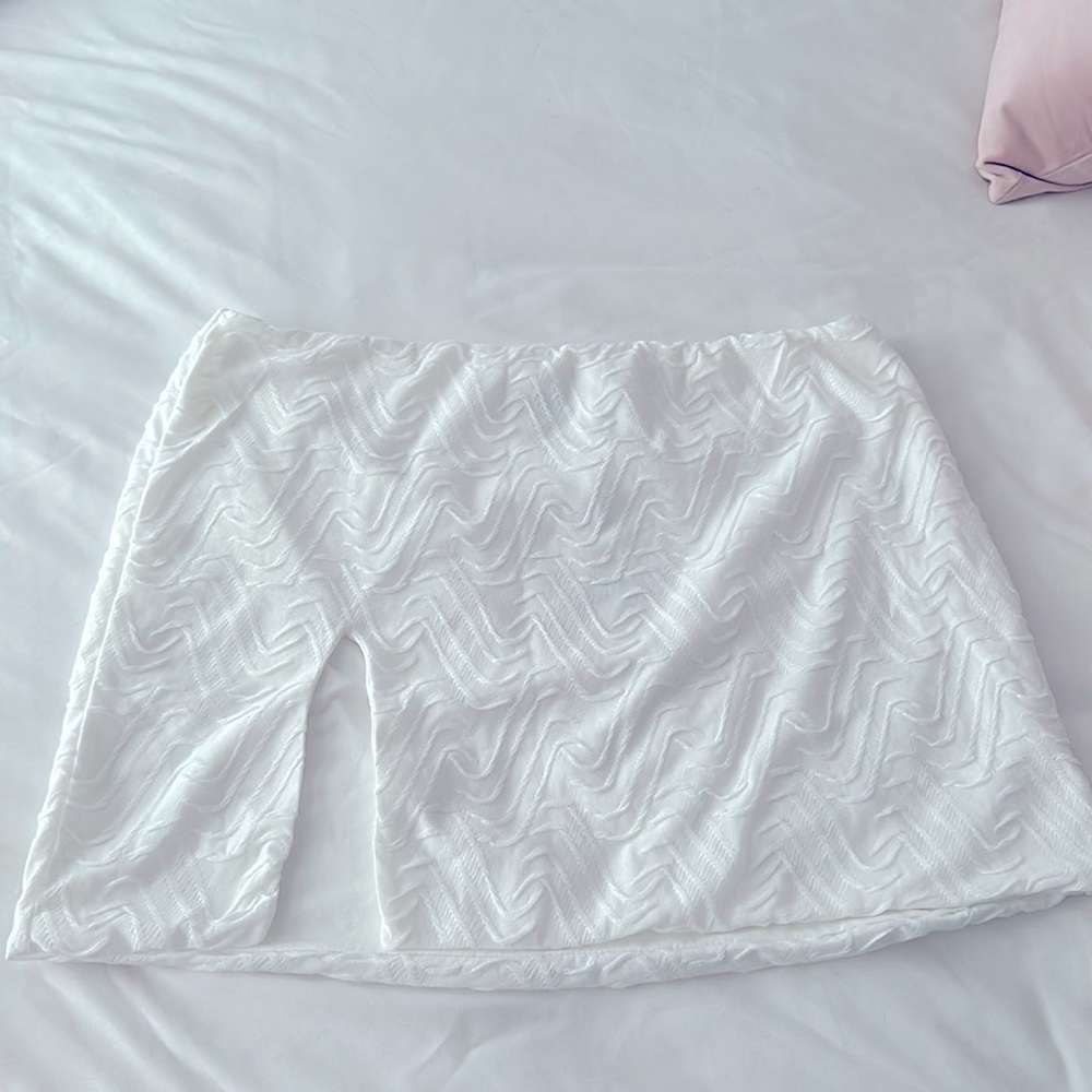 White lower impact skirt